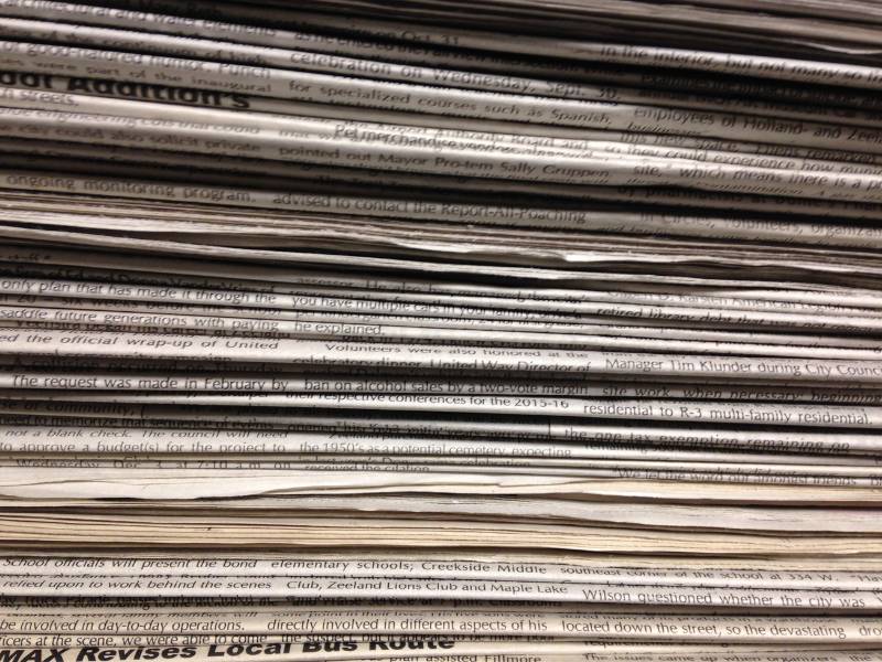 Stack of regional newspapers